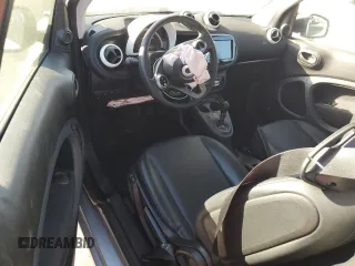 2016 Smart fortwo Passion z VIN WMEFJ5DAXGK125319, wystawiony jako Copart lot #87961455 z przebiegiem 37 246 mil mil oraz Szkody całkowita. Historia ofert i sprzedaży dostępna na DreamBid. Obrazek 8.