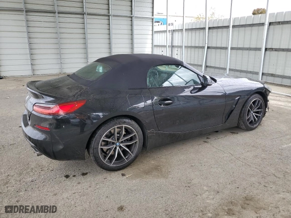 2022 BMW Z4 sDrive30i with VIN WBAHF3C08NWX72648, listed as a Copart auction lot 52153454 with 27,084 mi miles. Bid and sale history available at carsss.com. Image 3.