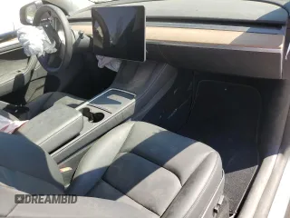 2024 Tesla Model Y Long Range с VIN 7SAYGDEE4RA243738, выставлен на аукционе Copart как лот 48953885 с пробегом Не указан миль и Списание • Salvage title. История ставок и продаж доступна на DreamBid. Изображение 8.