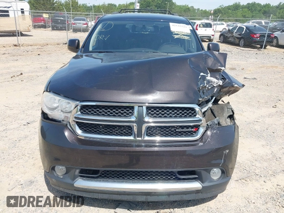 2013 Dodge Durango SXT with VIN 1C4RDJAG7DC580249, listed as a IAAI auction lot 42535723 with 199,626 mi miles and . Bid and sale history available at DreamBid. Image 12.