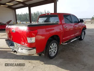 2012 Toyota Tundra 4WD Truck LTD with VIN 5TFHW5F13CX268552, listed as a IAAI auction lot 41461707 with 199,502 mi miles. Bid and sale history available at carsss.com. Image 4.