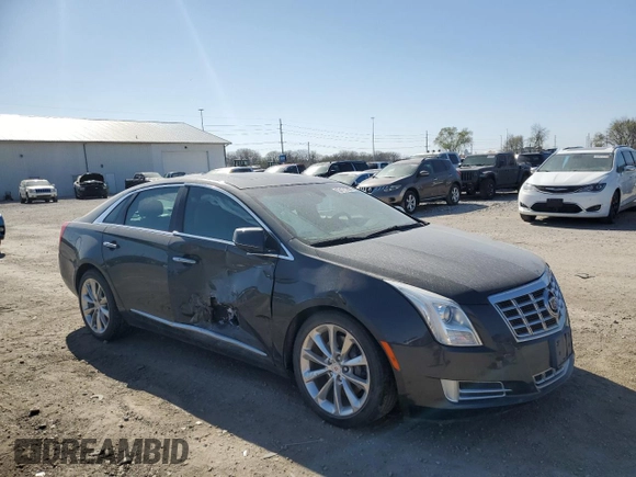 2013 Cadillac XTS Luxury with VIN 2G61R5S32D9167358, listed as a Copart auction lot 53121215 with 81,535 mi miles and Salvage title. Bid and sale history available at DreamBid. Image 4.