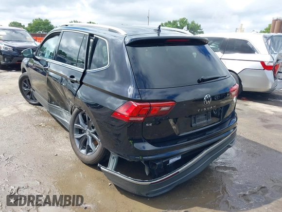 2023 Volkswagen Tiguan SE with VIN 3VV3B7AX4PM136264, listed as a IAAI auction lot 39724241 with 8,774 mi miles and . Bid and sale history available at DreamBid. Image 3.