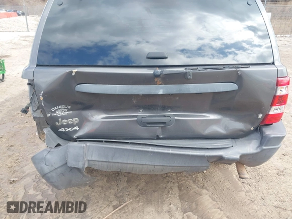 2004 Jeep Grand Cherokee Laredo z VIN 1J4GW48SX4C213322, wystawiony jako IAAI lot #41969362 z przebiegiem 273 876 mil mil oraz . Historia ofert i sprzedaży dostępna na DreamBid. Obrazek 6.