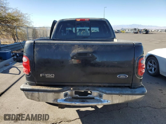 2002 Ford F-150 XLT with VIN 1FTRW07682KB94008, listed as a Copart auction lot 88724185 with 231,464 mi miles and Salvage Title. Bid and sale history available at carsss.com. Image 6.