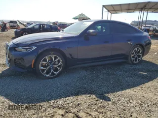2022 BMW i4 eDrive40 with VIN WBY73AW02NFN21694, listed as a Copart auction lot 71127684 with 37,115 mi miles and Salvage Title. Bid and sale history available at carsss.com. Image 1.