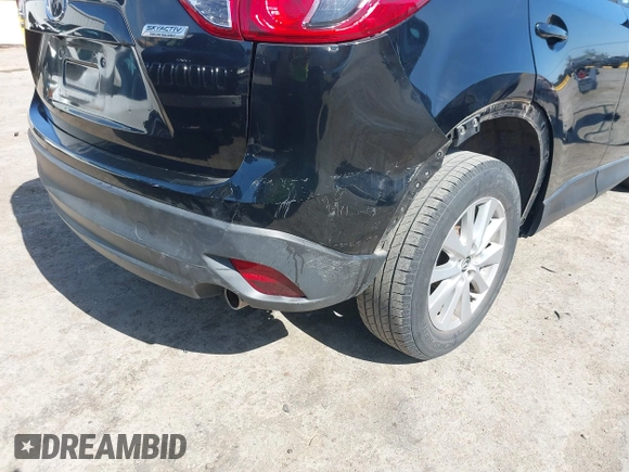 2016 Mazda CX-5 Touring z VIN JM3KE4CY2G0656270, wystawiony jako IAAI lot #42344489 z przebiegiem 60 449 mil mil oraz . Historia ofert i sprzedaży dostępna na DreamBid. Obrazek 6.