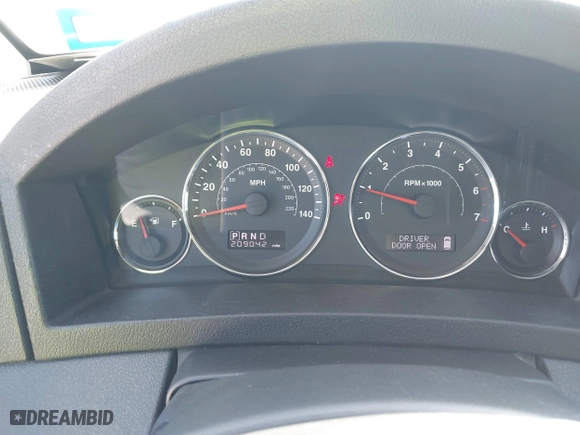 2010 Jeep Grand Cherokee Laredo with VIN 1J4PS4GK1AC111965, listed as a IAAI auction lot 41776362 with 209,042 mi miles. Bid and sale history available at carsss.com. Image 7.