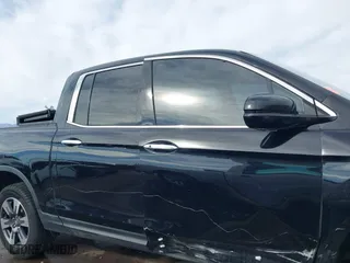 2017 Honda Ridgeline RTL-E with VIN 5FPYK3F7XHB030565, listed as a IAAI auction lot 41795386 with 79,252 mi miles. Bid and sale history available at carsss.com. Image 14.
