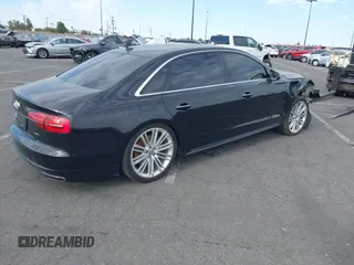 2017 Audi A8 L with VIN WAU44AFD5HN009133, listed as a IAAI auction lot 41352816 with 121,413 mi miles. Bid and sale history available at carsss.com. Image 4.