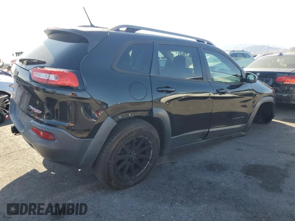 2015 Jeep Cherokee Trailhawk with VIN 1C4PJMBS8FW699319, listed as a Copart auction lot 61612245 with 173,581 mi miles and Clean title. Bid and sale history available at DreamBid. Image 3.