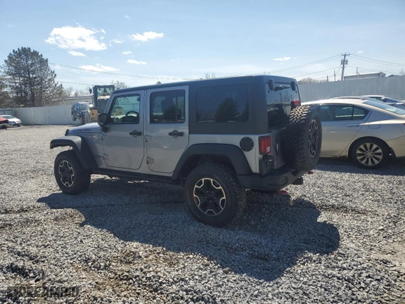 2015 Jeep Wrangler Unlimited Rubicon Hard Rock with VIN 1C4HJWFG2FL686556, listed as a Copart auction lot 54049955 with 126,675 mi miles and Salvage Title. Bid and sale history available at carsss.com. Image 2.