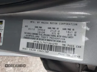 2012 Mazda Mazda3 i Touring with VIN JM1BL1L7XC1664299, listed as a IAAI auction lot 41568259 with 198,926 mi miles. Bid and sale history available at carsss.com. Image 9.