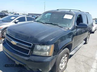 2011 Chevrolet Suburban LT with VIN 1GNSCJE0XBR285973, listed as a IAAI auction lot 42007844 with 252,994 mi miles. Bid and sale history available at carsss.com. Image 17.