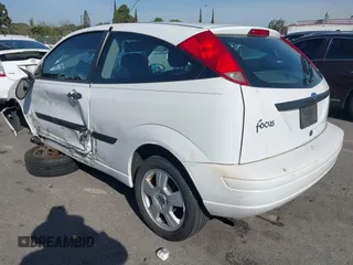 2003 Ford Focus ZX3 with VIN 3FAFP31ZX3R163723, listed as a IAAI auction lot 41866542 with 83,370 mi miles and . Bid and sale history available at DreamBid. Image 3.