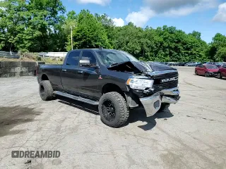 2019 Ram 2500 Big Horn with VIN 3C6UR5JLXKG606957, listed as a Copart auction lot 57713014 with 102,399 mi miles and Salvage Title. Bid and sale history available at carsss.com. Image 10.