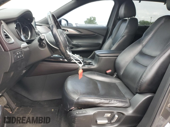 2016 Mazda CX-9 Grand Touring with VIN JM3TCADY3G0125814, listed as a Copart auction lot 58299595 with 127,035 mi miles and Salvage title. Bid and sale history available at DreamBid. Image 7.