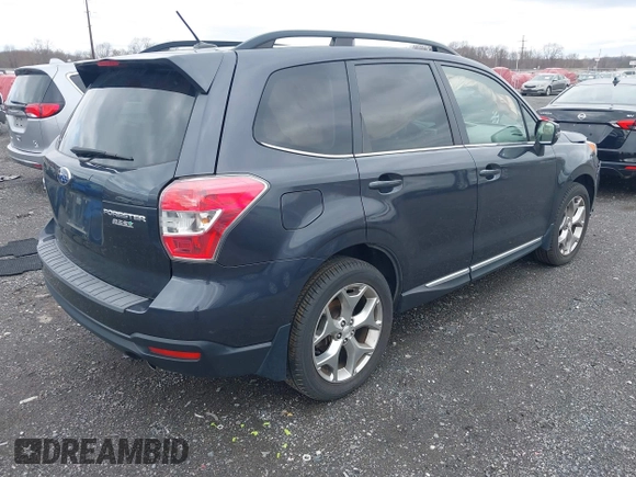 2015 Subaru Forester Touring with VIN JF2SJAWC0FH585722, listed as a IAAI auction lot 41734016 with 90,728 mi miles and . Bid and sale history available at DreamBid. Image 4.