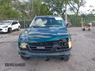 1997 Isuzu Hombre S z VIN 1GGCS1445V8656678, wystawiony jako IAAI lot #41953915 z przebiegiem 114 797 mil mil oraz . Historia ofert i sprzedaży dostępna na DreamBid. Obrazek 6.