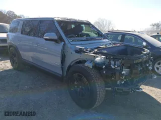 2024 Rivian R1S Adventure with VIN 7PDSGBBA8RN043516, listed as a IAAI auction lot 41675732 with 1 mi miles. Bid and sale history available at carsss.com. Image 1.