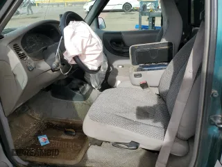 1998 Ford Ranger XL with VIN 1FTYR10C6WUC52233, listed as a Copart auction lot 56231925 with 198,687 mi miles and Salvage title. Bid and sale history available at DreamBid. Image 7.