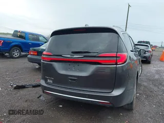2022 Chrysler Pacifica Touring L with VIN 2C4RC1BG8NR116770, listed as a IAAI auction lot 42093616 with 98,479 mi miles and . Bid and sale history available at DreamBid. Image 16.