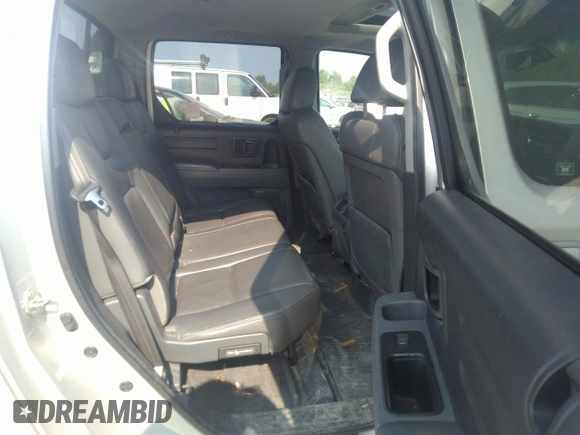 2007 Honda Ridgeline RTL z VIN 2HJYK16537H501200, wystawiony jako IAAI lot #42425662 z przebiegiem 188 618 mil mil oraz . Historia ofert i sprzedaży dostępna na DreamBid. Obrazek 8.