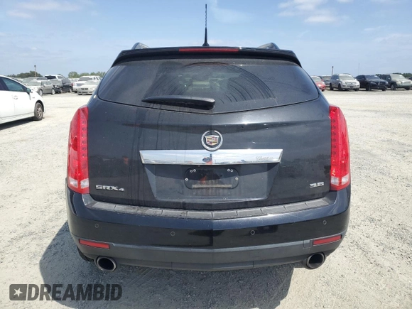 2013 Cadillac SRX Performance Collection z VIN 3GYFNHE37DS609463, wystawiony jako Copart lot #54606255 z przebiegiem 180 059 mil mil oraz Szkoda całkowita • Salvage title. Historia ofert i sprzedaży dostępna na DreamBid. Obrazek 6.
