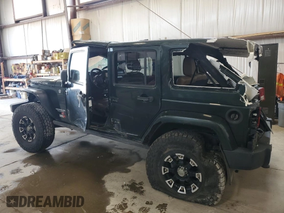 2012 Jeep Wrangler Unlimited Rubicon with VIN 1C4HJWFG4CL119390, listed as a Copart auction lot 60026425 with 305,189 mi miles and Salvage title. Bid and sale history available at DreamBid. Image 2.