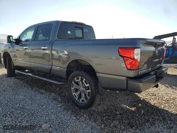 2016 Nissan Titan XD PRO-4X with VIN 1N6BA1F44GN517947, listed as a Copart auction lot 75524654 with 79,016 mi miles and Salvage Title. Bid and sale history available at carsss.com. Image 2.