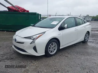 2018 Toyota Prius Two with VIN JTDKARFU9J3054742, listed as a IAAI auction lot 41641032 with 209,986 mi miles and . Bid and sale history available at DreamBid. Image 2.