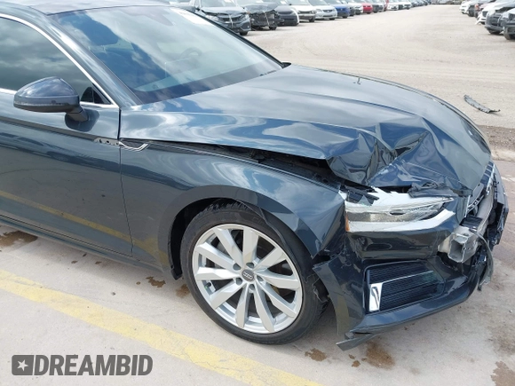 2018 Audi A5 Sportback Premium z VIN WAUANCF5XJA022221, wystawiony jako IAAI lot #42041410 z przebiegiem 94 851 mil mil oraz . Historia ofert i sprzedaży dostępna na DreamBid. Obrazek 6.