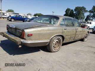 1974 Jaguar XJ with VIN UE2T52398, listed as a Copart auction lot 59589415 with 93,740 mi miles and Clean title. Bid and sale history available at DreamBid. Image 3.