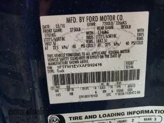 2010 Ford F-150 XL with VIN 1FTFW1EVXAFB92416, listed as a Copart auction lot 51909125 with 210,718 mi miles and Salvage Title. Bid and sale history available at carsss.com. Image 15.