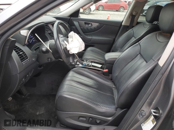 2017 Infiniti QX70 z VIN JN8CS1MW6HM415974, wystawiony jako Copart lot #86130374 z przebiegiem 77 638 mil mil oraz Szkoda całkowita • Salvage title. Historia ofert i sprzedaży dostępna na DreamBid. Obrazek 7.