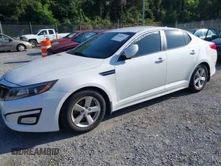 2015 Kia Optima LX with VIN 5XXGM4A70FG472650, listed as a IAAI auction lot 42698013 with 213,713 mi miles and . Bid and sale history available at DreamBid. Image 2.