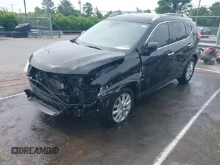 2019 Nissan Rogue SV with VIN JN8AT2MT1KW261931, listed as a IAAI auction lot 42274227 with 141,518 mi miles and . Bid and sale history available at DreamBid. Image 17.