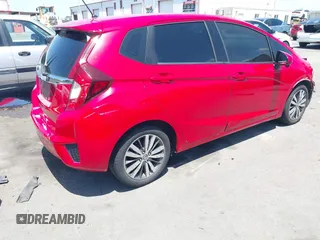 2015 Honda Fit EX-L z VIN 3HGGK5H84FM742893, wystawiony jako IAAI lot #42272487 z przebiegiem 84 942 mil mil oraz . Historia ofert i sprzedaży dostępna na DreamBid. Obrazek 4.