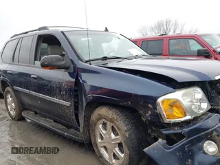 2006 GMC Envoy SLE z VIN 1GKDT13S862329493, wystawiony jako IAAI lot #41513303 z przebiegiem 118 355 mil mil oraz . Historia ofert i sprzedaży dostępna na DreamBid. Obrazek 13.