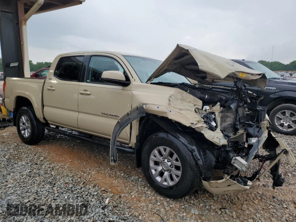 2017 Toyota Tacoma SR5 with VIN 5TFAZ5CN2HX030781, listed as a Copart auction lot 53957535 with 105,606 mi miles and Salvage Title. Bid and sale history available at DreamBid. Image 4.