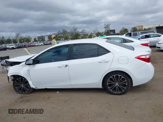 2014 Toyota Corolla L with VIN 5YFBURHE2EP085339, listed as a IAAI auction lot 42121009 with 122,339 mi miles and . Bid and sale history available at DreamBid. Image 15.