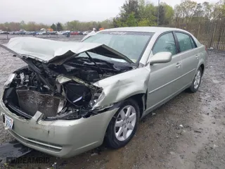 2007 Toyota Avalon XL with VIN 4T1BK36B27U236094, listed as a IAAI auction lot 42025285 with 208,741 mi miles. Bid and sale history available at carsss.com. Image 2.
