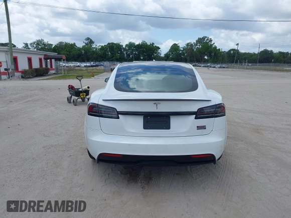 2022 Tesla Model S Plaid with VIN 5YJSA1E6XNF473888, listed as a IAAI auction lot 42141141 with 28,584 mi miles and . Bid and sale history available at carsss.com. Image 16.