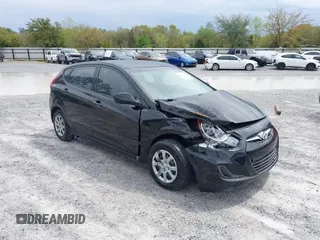 2014 Hyundai Accent GS with VIN KMHCT5AE7EU164658, listed as a IAAI auction lot 41911092 with 132,442 mi miles. Bid and sale history available at carsss.com. Image 1.