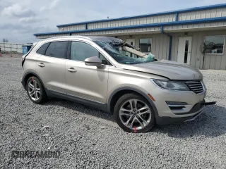 2015 Lincoln MKC with VIN 5LMTJ2AH8FUJ10105, listed as a Copart auction lot 51577095 with Not Provided miles and Salvage Title. Bid and sale history available at carsss.com. Image 4.