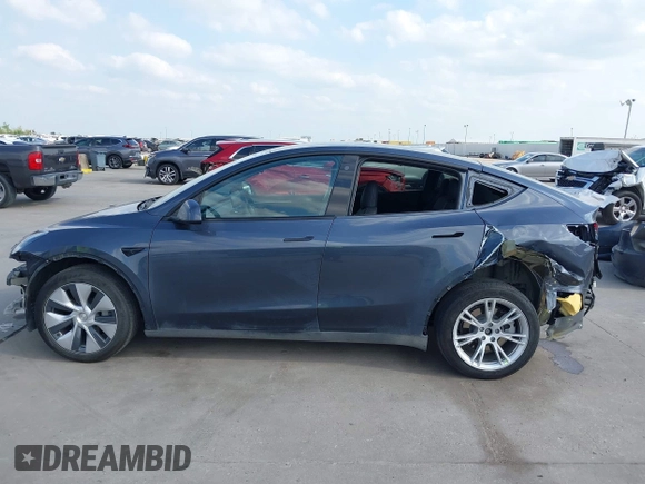 2023 Tesla Model Y Long Range with VIN 7SAYGDEEXPA078629, listed as a IAAI auction lot 42046354 with 27,245 mi miles and . Bid and sale history available at DreamBid. Image 15.