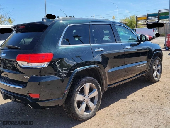 2014 Jeep Grand Cherokee Overland with VIN 1C4RJFCT7EC187319, listed as a Copart auction lot 53850035 with 98,314 mi miles and Clean Title. Bid and sale history available at carsss.com. Image 4.