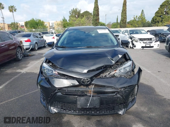 2019 Toyota Corolla L with VIN 5YFBURHE6KP892992, listed as a IAAI auction lot 42057187 with 80,304 mi miles and . Bid and sale history available at DreamBid. Image 12.