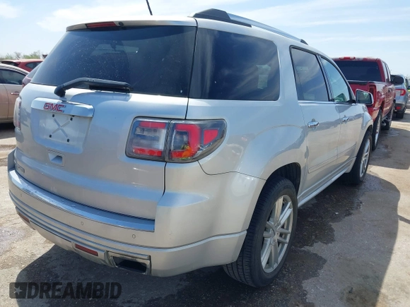 2014 GMC Acadia Denali z VIN 1GKKRTKD0EJ192610, wystawiony jako IAAI lot #41819095 z przebiegiem 121 075 mil mil oraz . Historia ofert i sprzedaży dostępna na DreamBid. Obrazek 4.