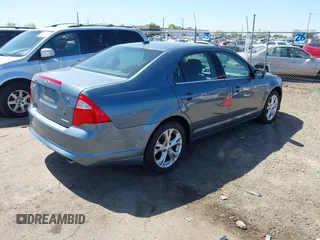 2012 Ford Fusion SE z VIN 3FAHP0HG9CR138274, wystawiony jako IAAI lot #41970444 z przebiegiem 105 707 mil mil oraz . Historia ofert i sprzedaży dostępna na DreamBid. Obrazek 4.
